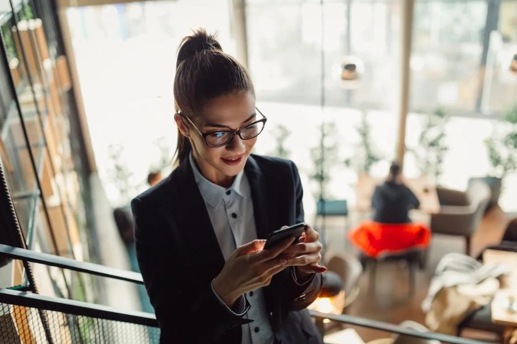 Professional businesswoman on mobile