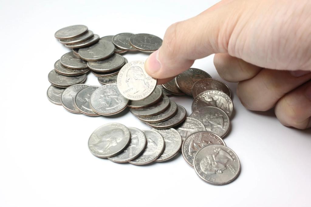 Coins representing budget savings